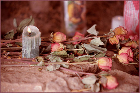 Candles and Roses, color photograph by Woody Glloway, Santa Fe, NM
